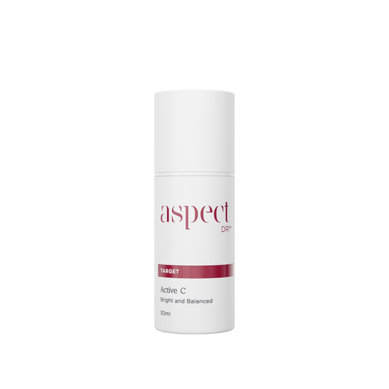 New Aspect Dr Active C antioxidant and peptide serum in 30ml white airless pump bottle with white cap, and burgundy accent and branding.