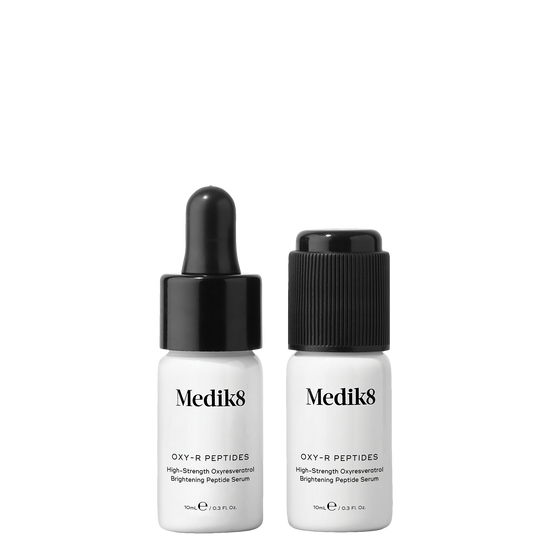 Medik8 Oxy-R Peptides, two 10ml frosted glass bottles with black  dropper caps; high-strength Oxyresveratrol brightening peptide serum. 