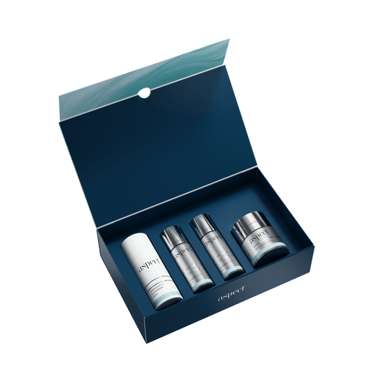 Aspect Everyday Skin Essentials Kit in a navy blue rectangular box, features Purastat 5 Cleanser (100ml) in a clear pump bottle, Extreme C 20 (30ml), Extreme B 17 (30ml) and Phytostat 9 (50g).