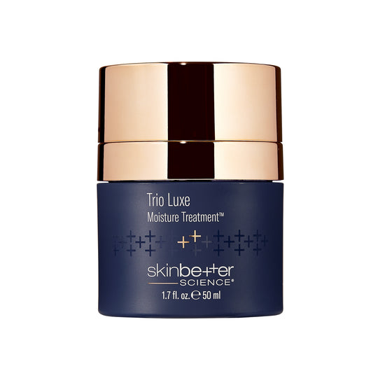 SkinBetter Science trio lux moisture treatment cream in a blue container with a gold lid