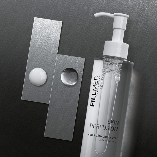 Fillmed skin perfusion cleansing oil with clear product swatch on metal displays