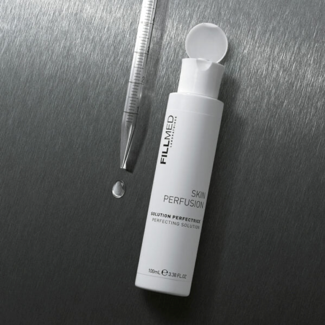 Fillmed Perfecting Solution, 100ml white bottle on silver metal and dropper product swatch